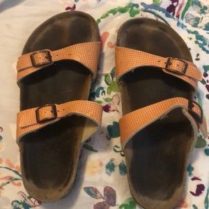 Birkenstock Burki’s sandals with orange straps